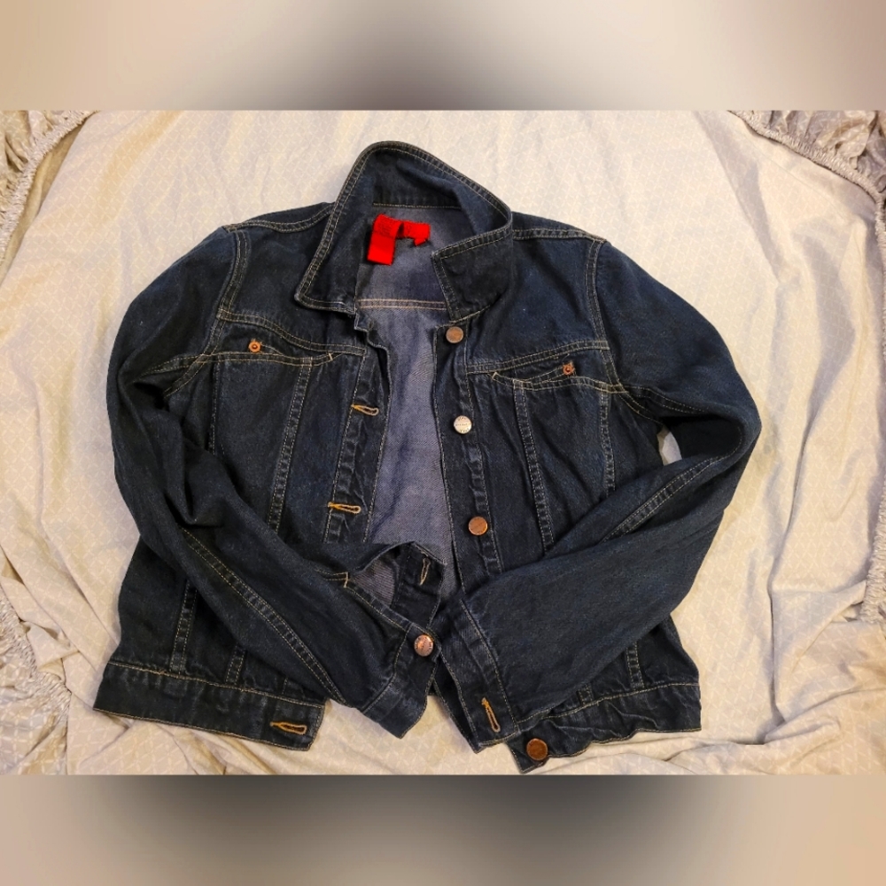 Small dark blue Jean jacket.